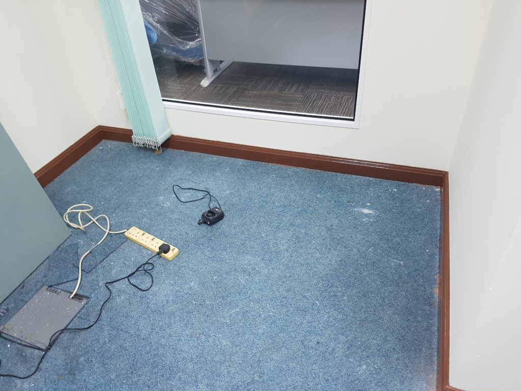 Existing carpet awaiting removal