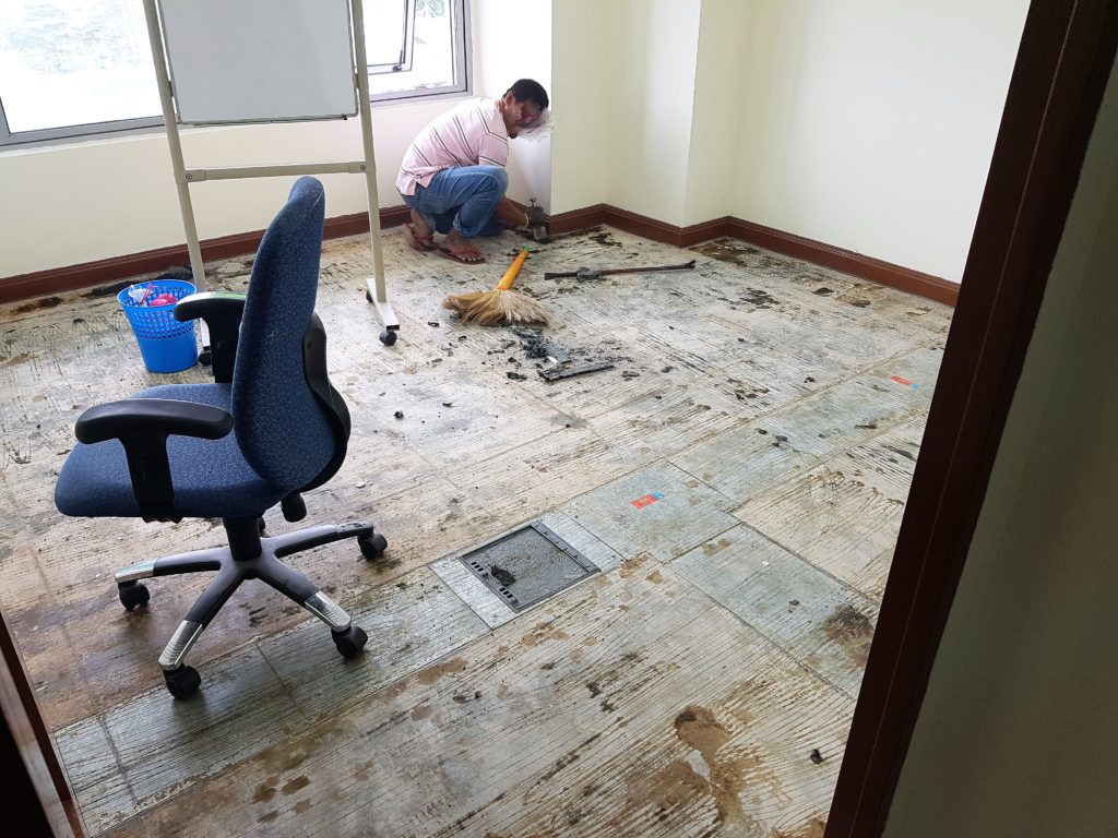 Existing carpet removal and adhesive peeling off process