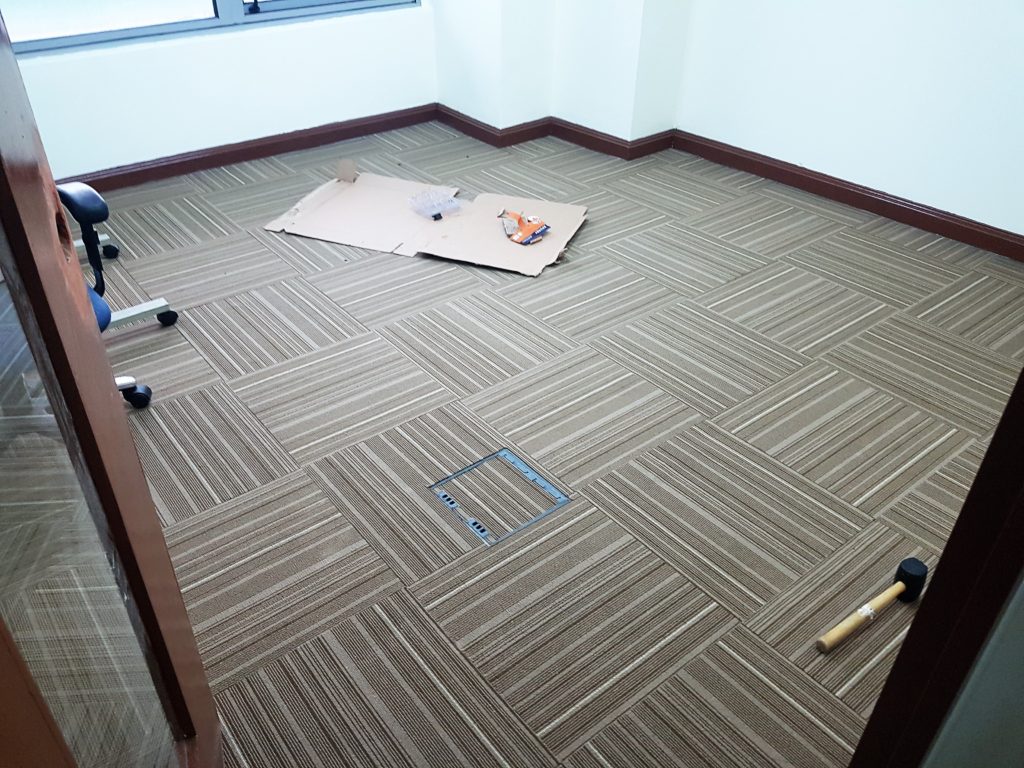 New carpet tiles installed