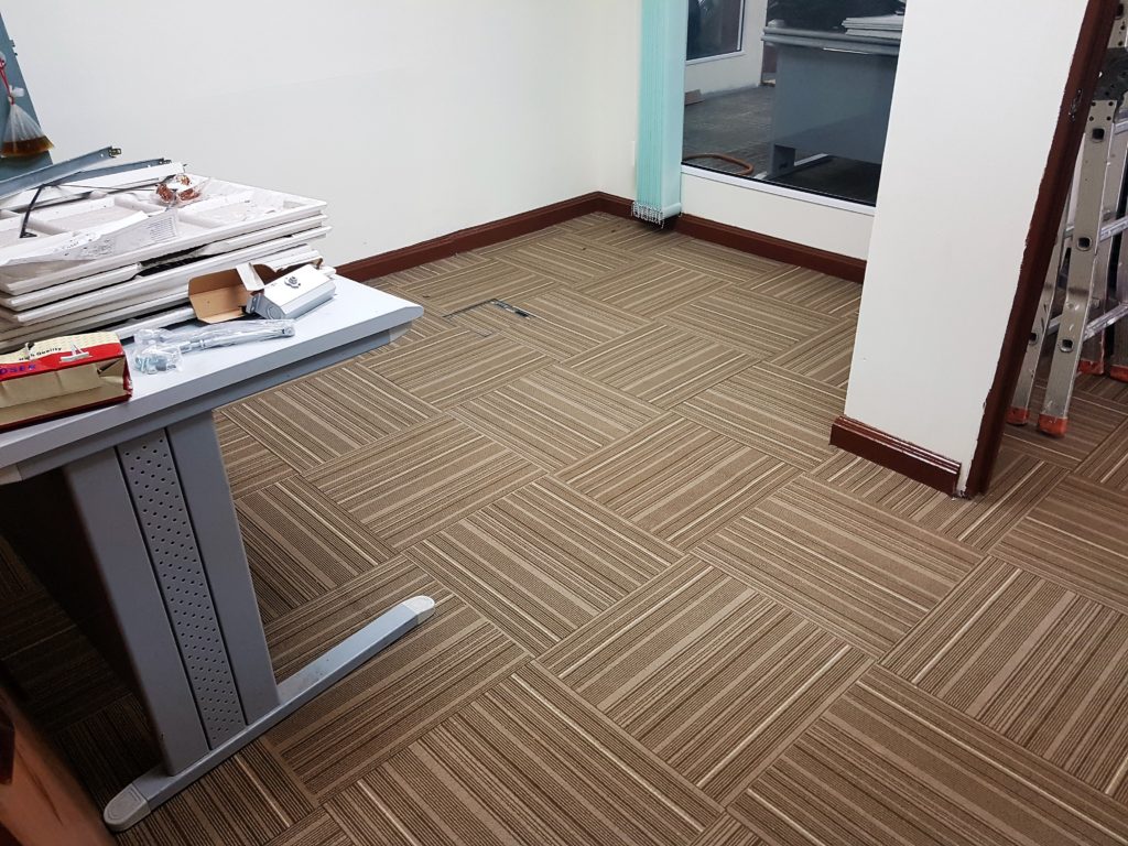 New carpet tiles installed