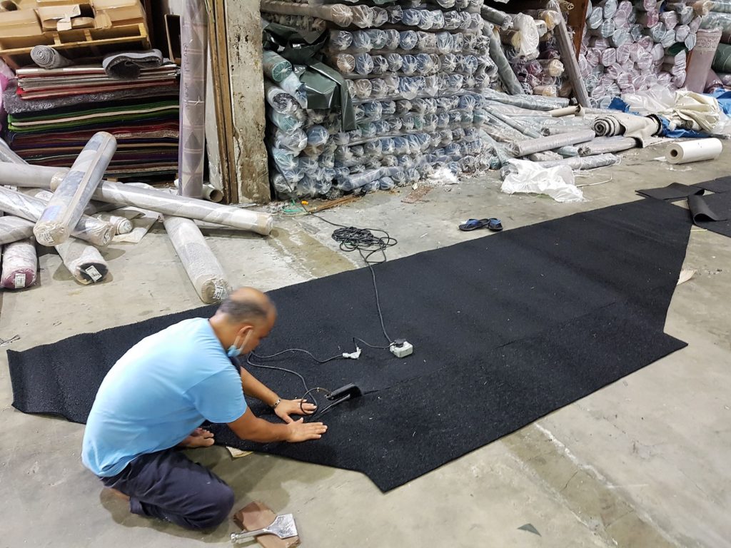 In the factory, the joined and fixed with perimeter rubber edging and left for curing.