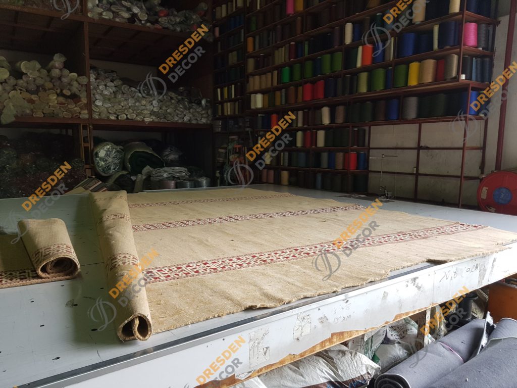 Carpet brought to factory after site custom cut for side edging stitch.