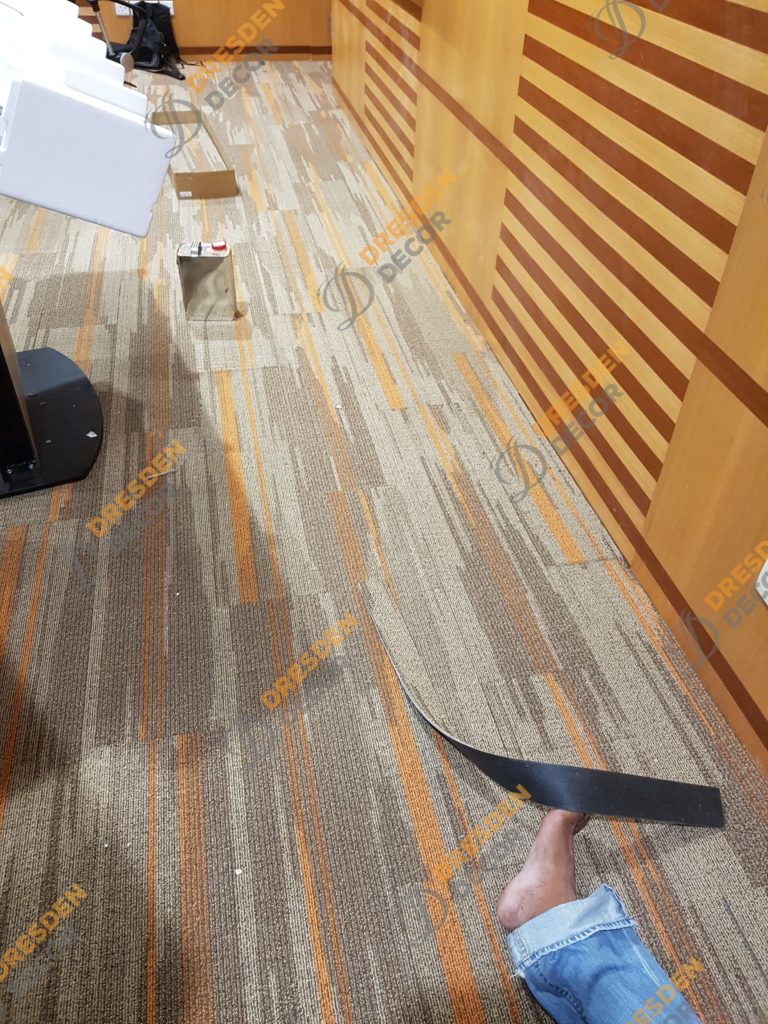 Carpet installation in progress.
