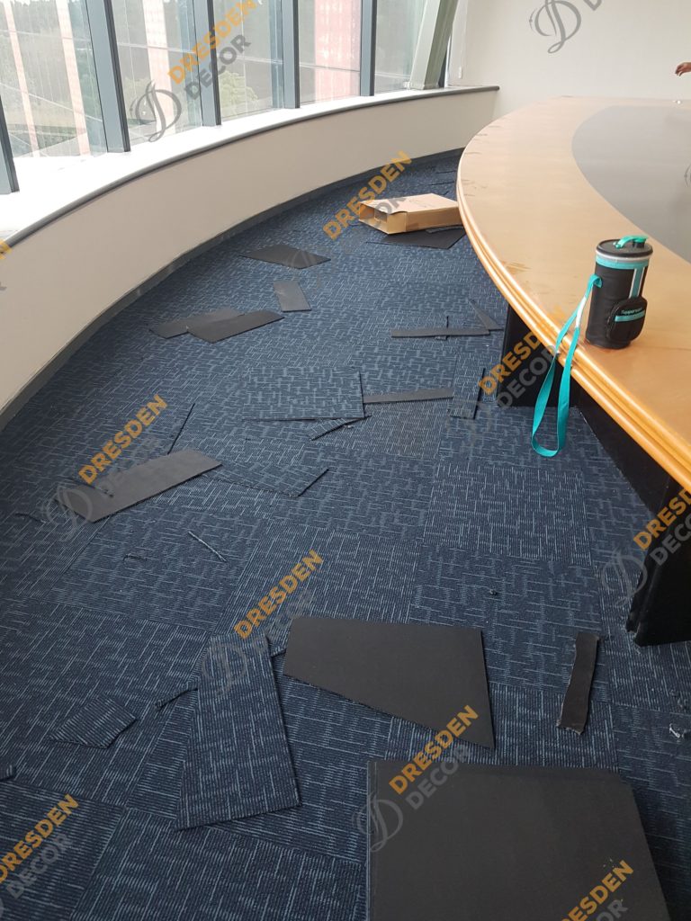 Carpet Tiles installation in progress.
