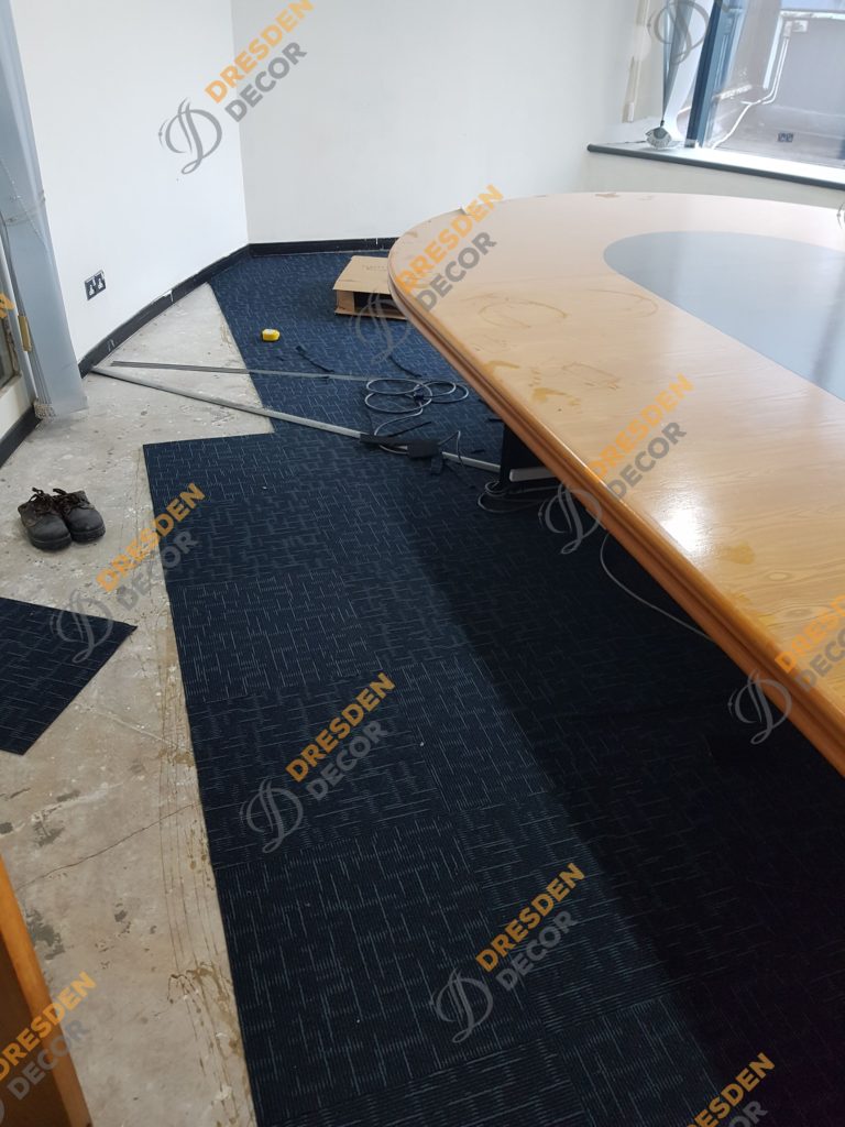 Carpet Tiles installation in progress.
