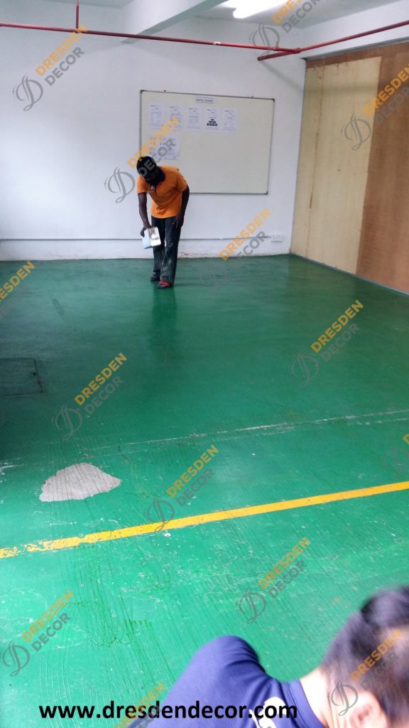 Floor is prepared prior carpet installation.