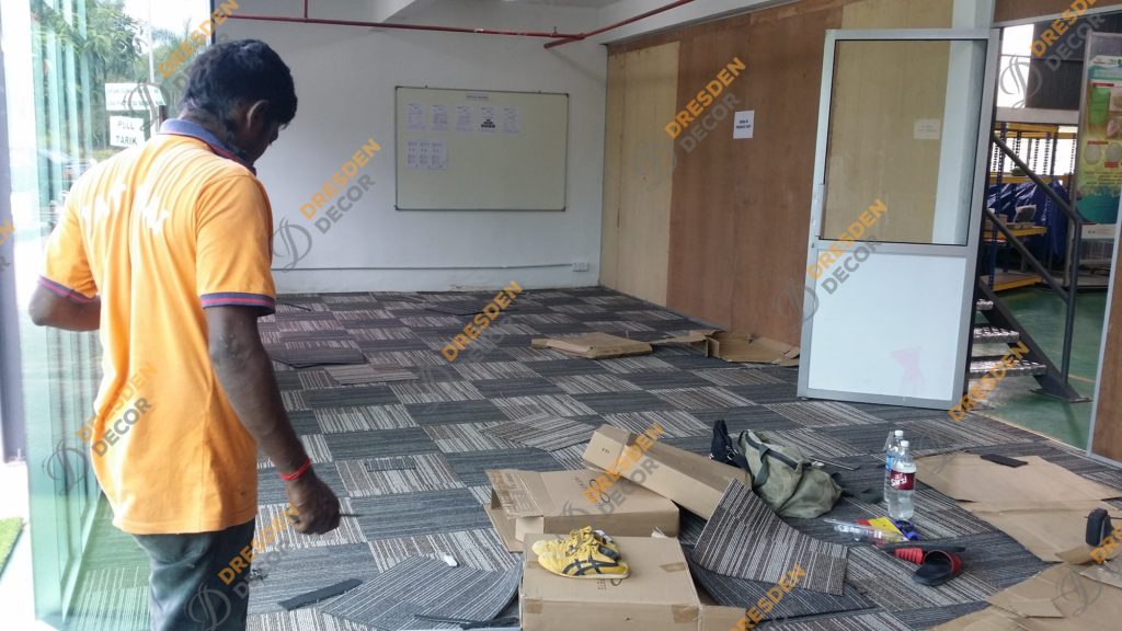 Carpet Tiles installation in progress.