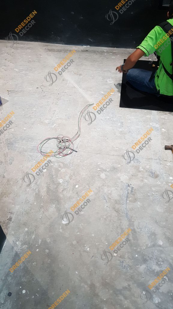 Carpet Tiles installation in progress.