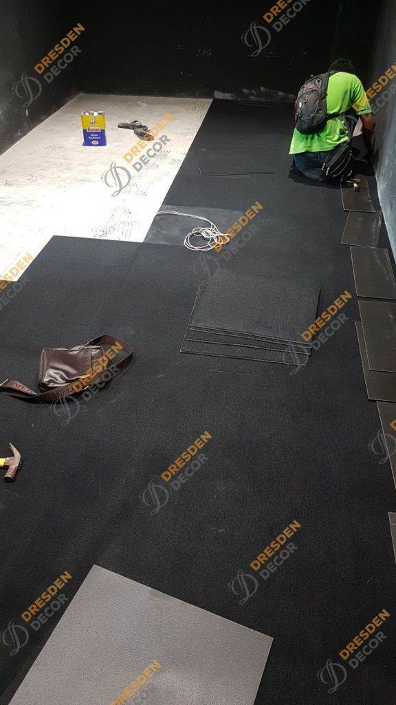 Carpet Tiles installation in progress.