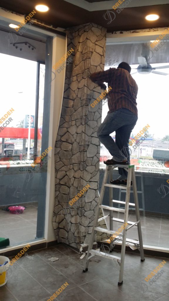 Wallpaper installation in progress.