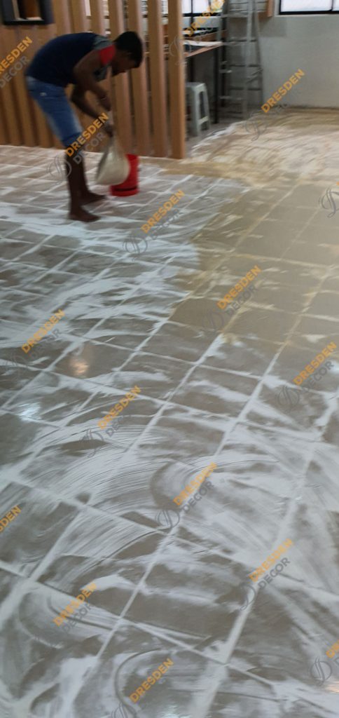 Existing floor tiles gaps are closed with stopper compound