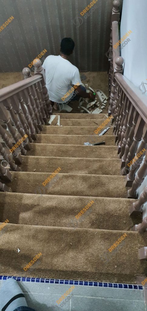Wooden stairs installation in progress.