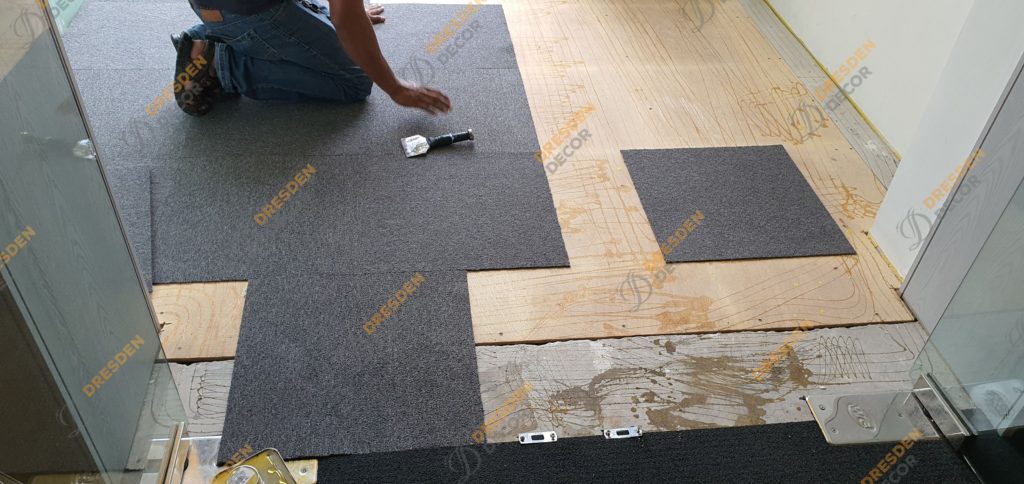 Installation of new carpet tiles