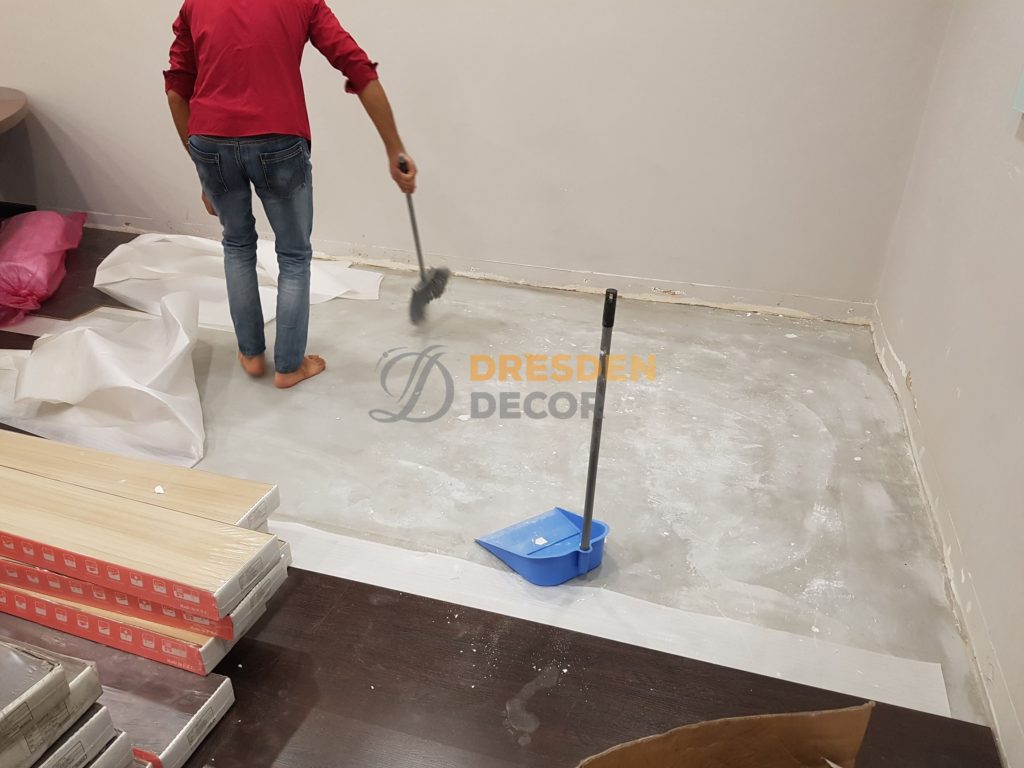 Existing floorboards removed and floor is cleaned
