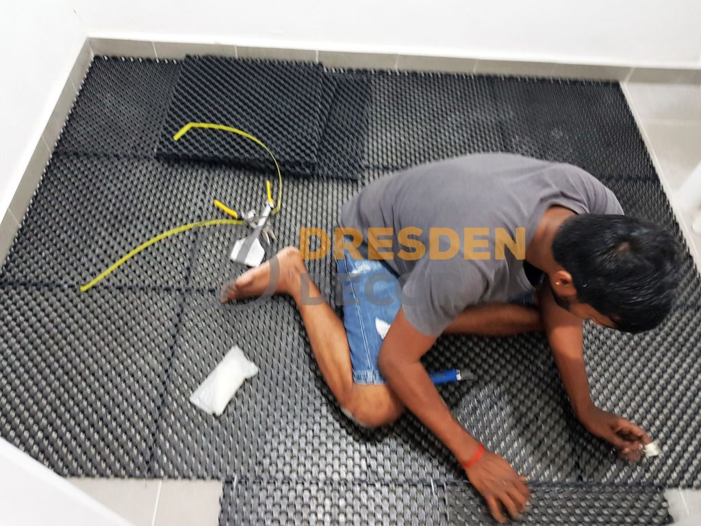 Drain cell installation in progress